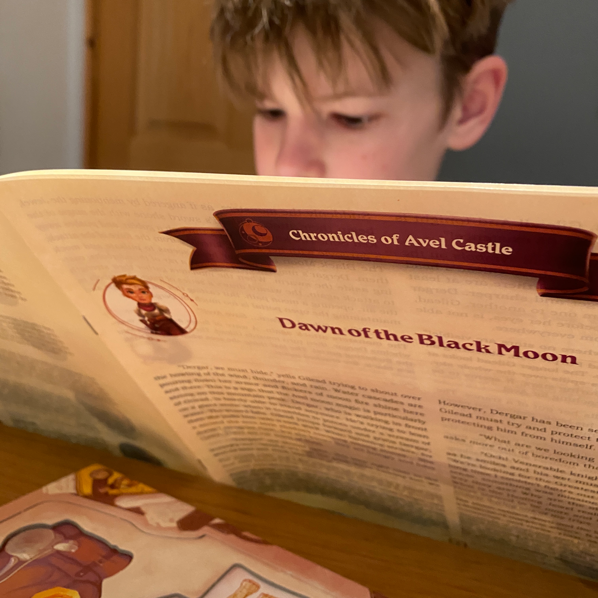 Chronicles-of-Avel-George-reading-about-the-monsters