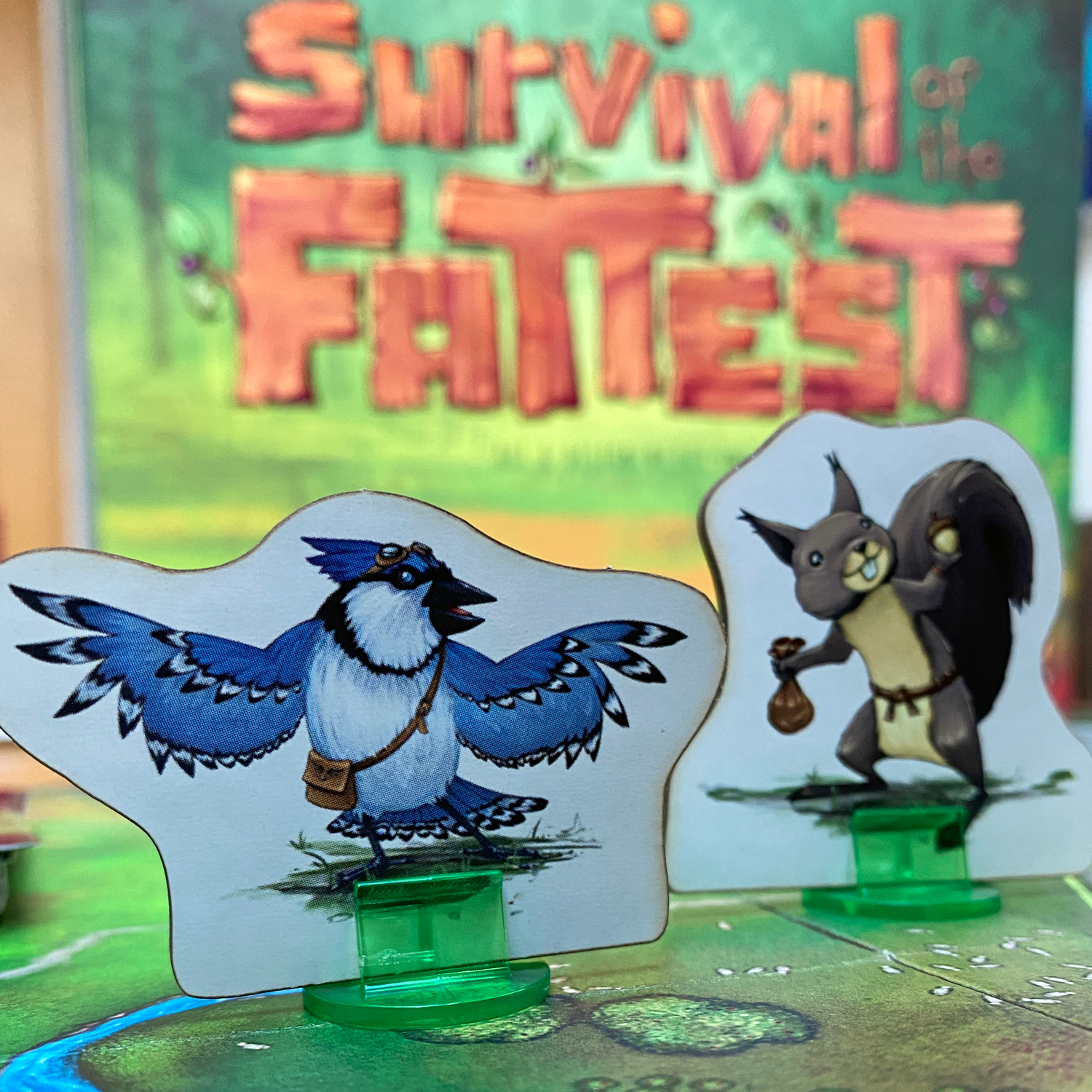 Standees from Survival of the FattestImage © Board Game Review UK